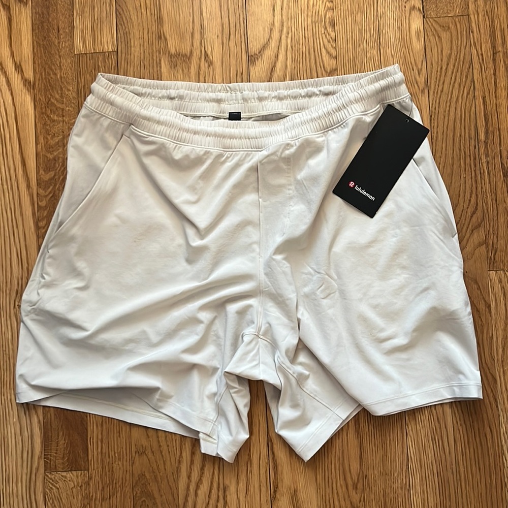 Men’s NWT Lululemon Pace Breaker Short - 7 inch inseam, size XL. Cream color.